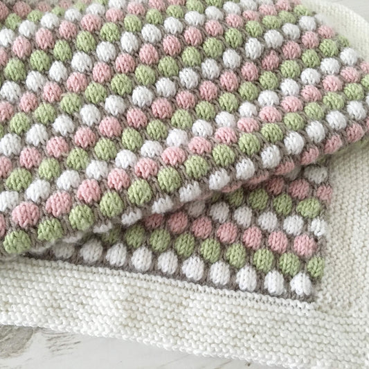 a photo of a baby blanket knitting pattern