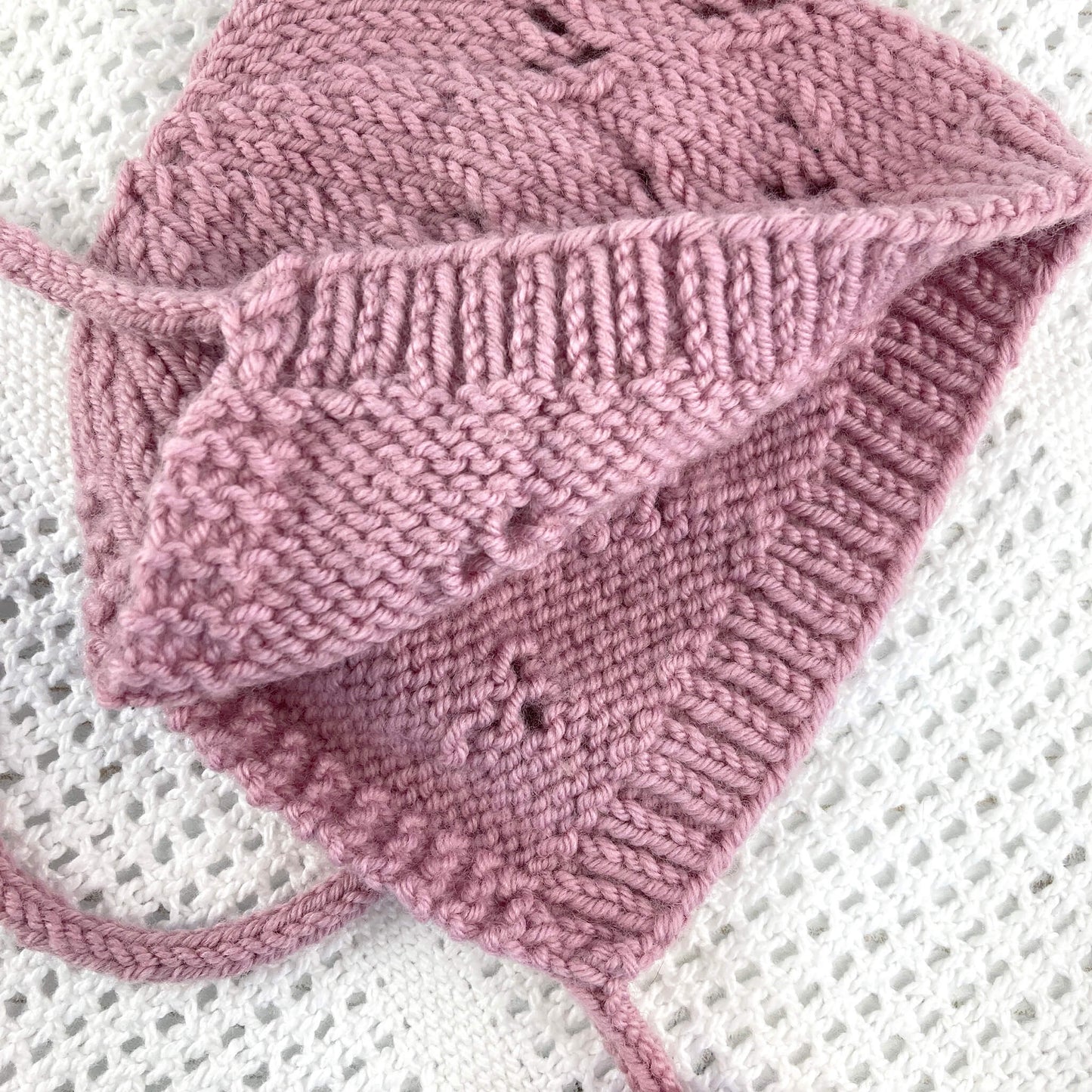 photo shows the inside of a hat for a baby bonnet knit pattern