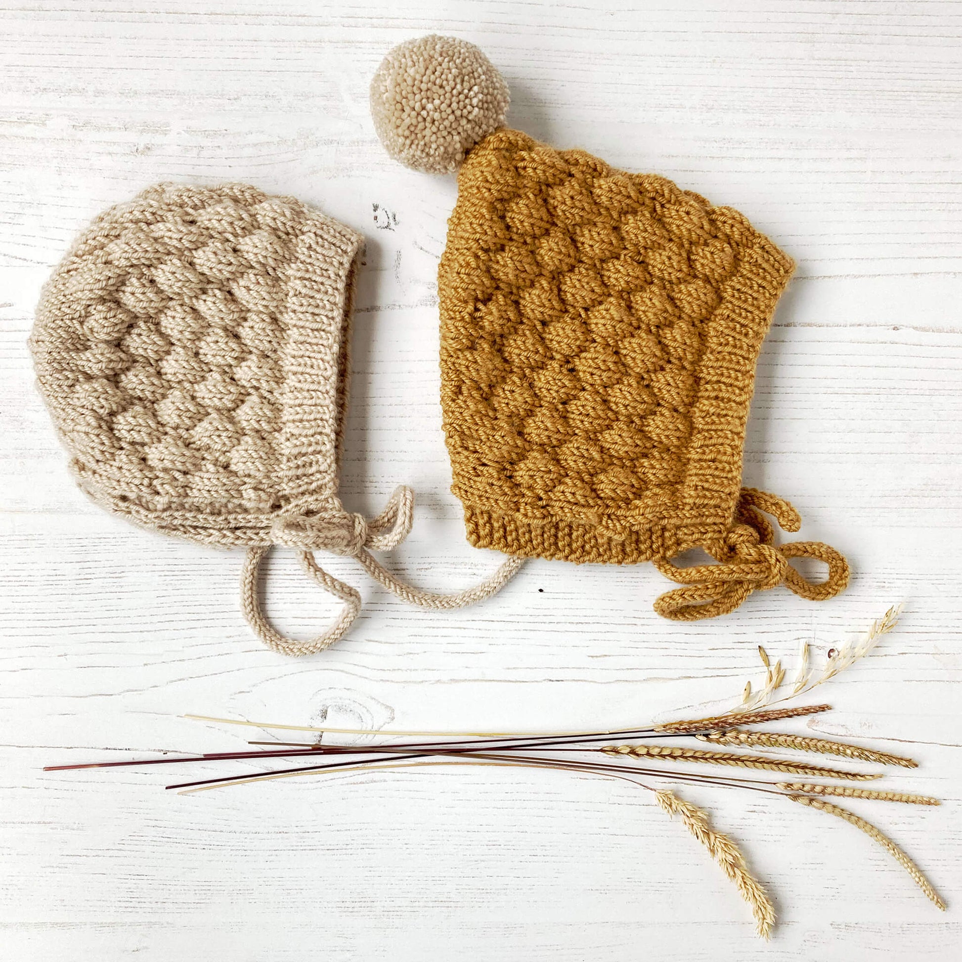 hat patterns for baby knitting. Two styles of hat are shown, both in bubble stitch pattern