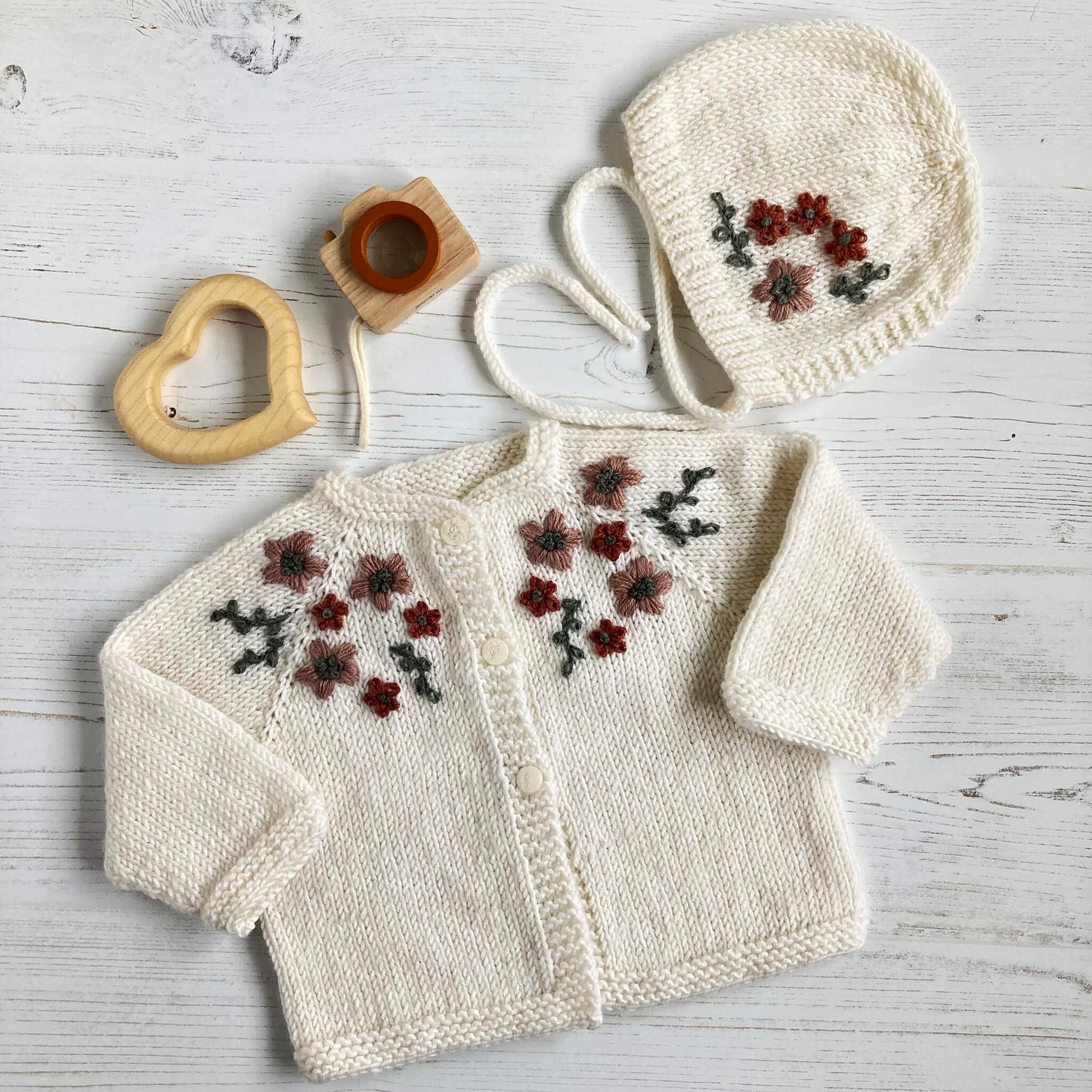 baby-knitting-patterns with matching flower embroidery on both