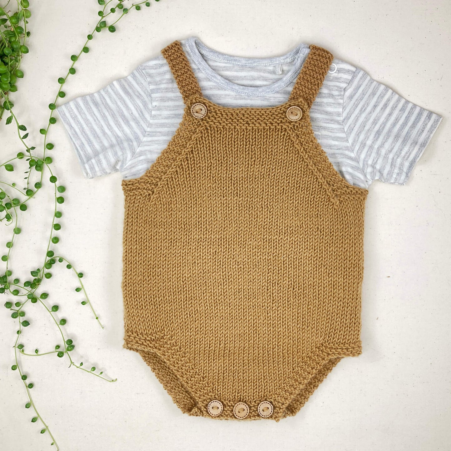 a beginner level knitted romper pattern