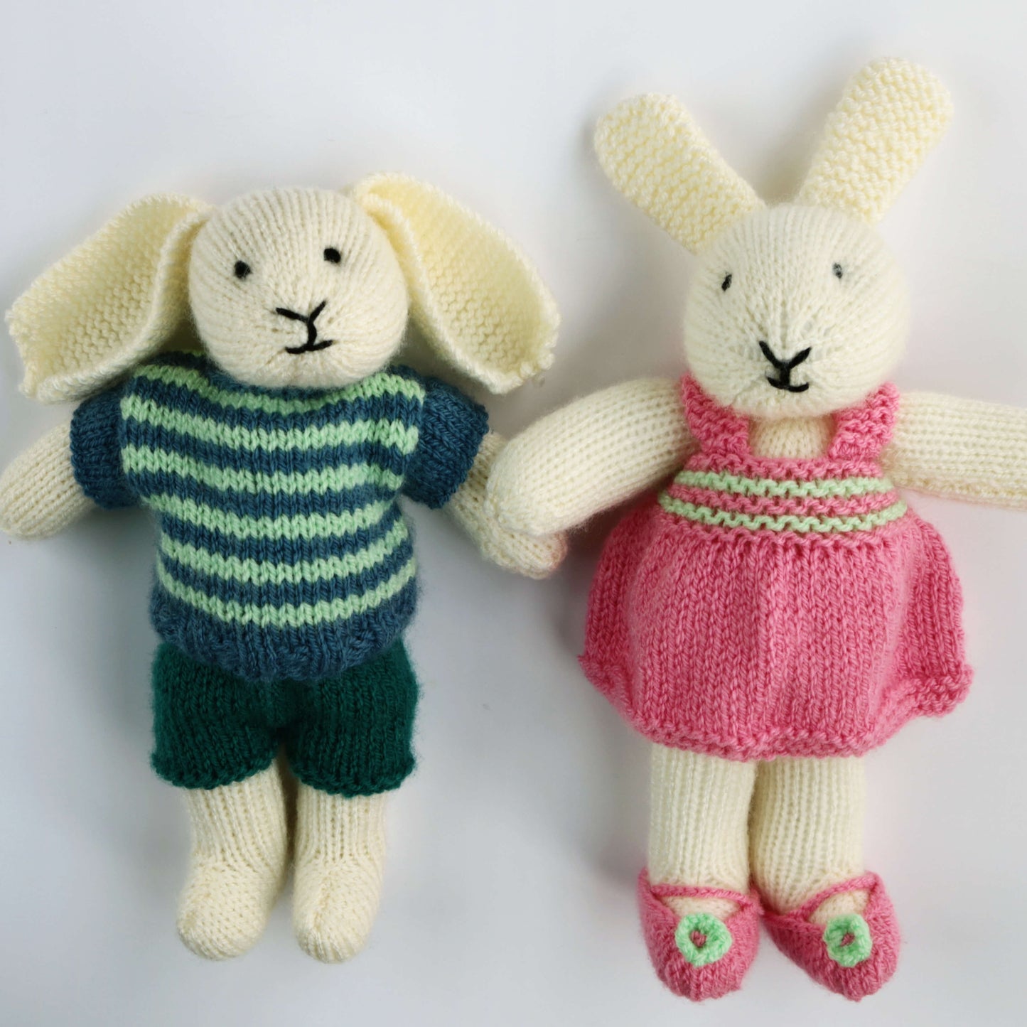 a boy and a girl dressed bunnies knitting pattern