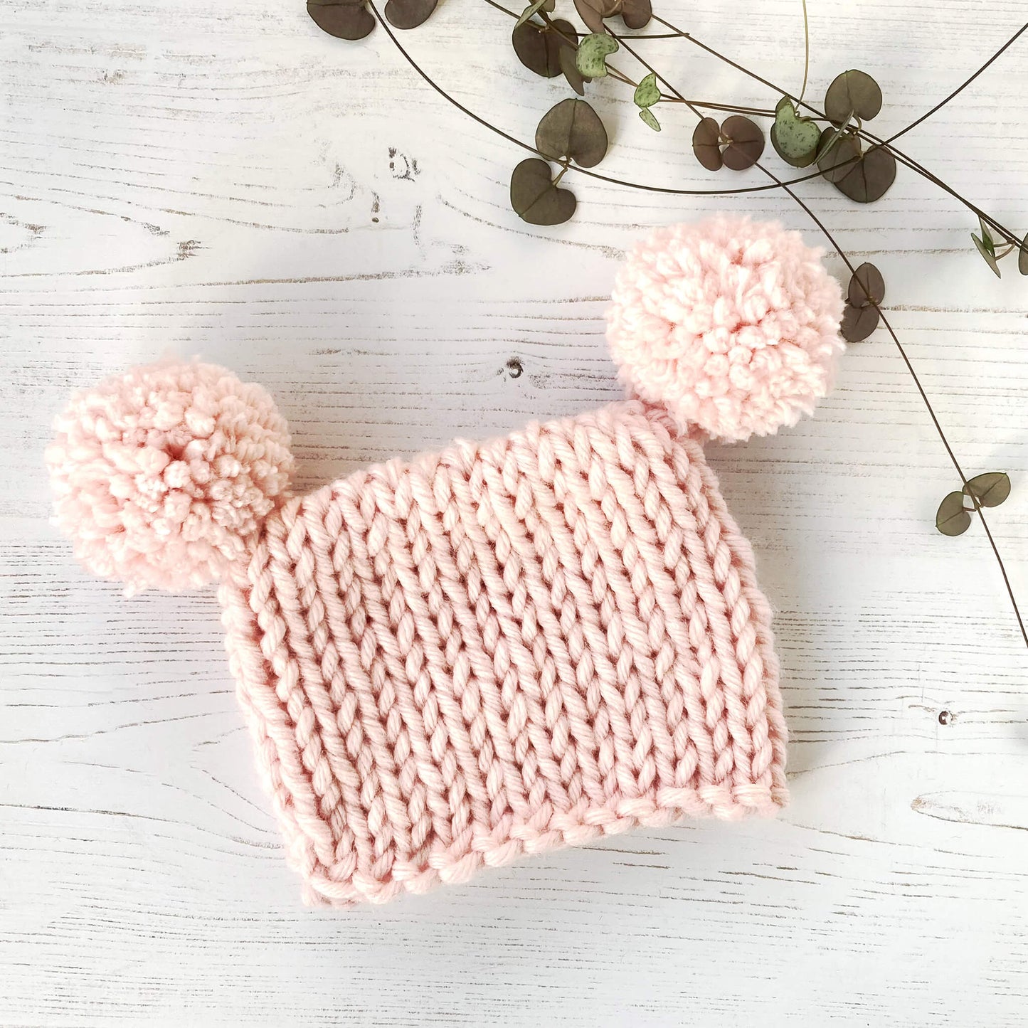 easy baby hat knitting pattern, tea bag hat with pompoms