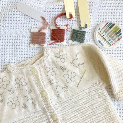 knitting pattern for a baby cardigan with embroidery