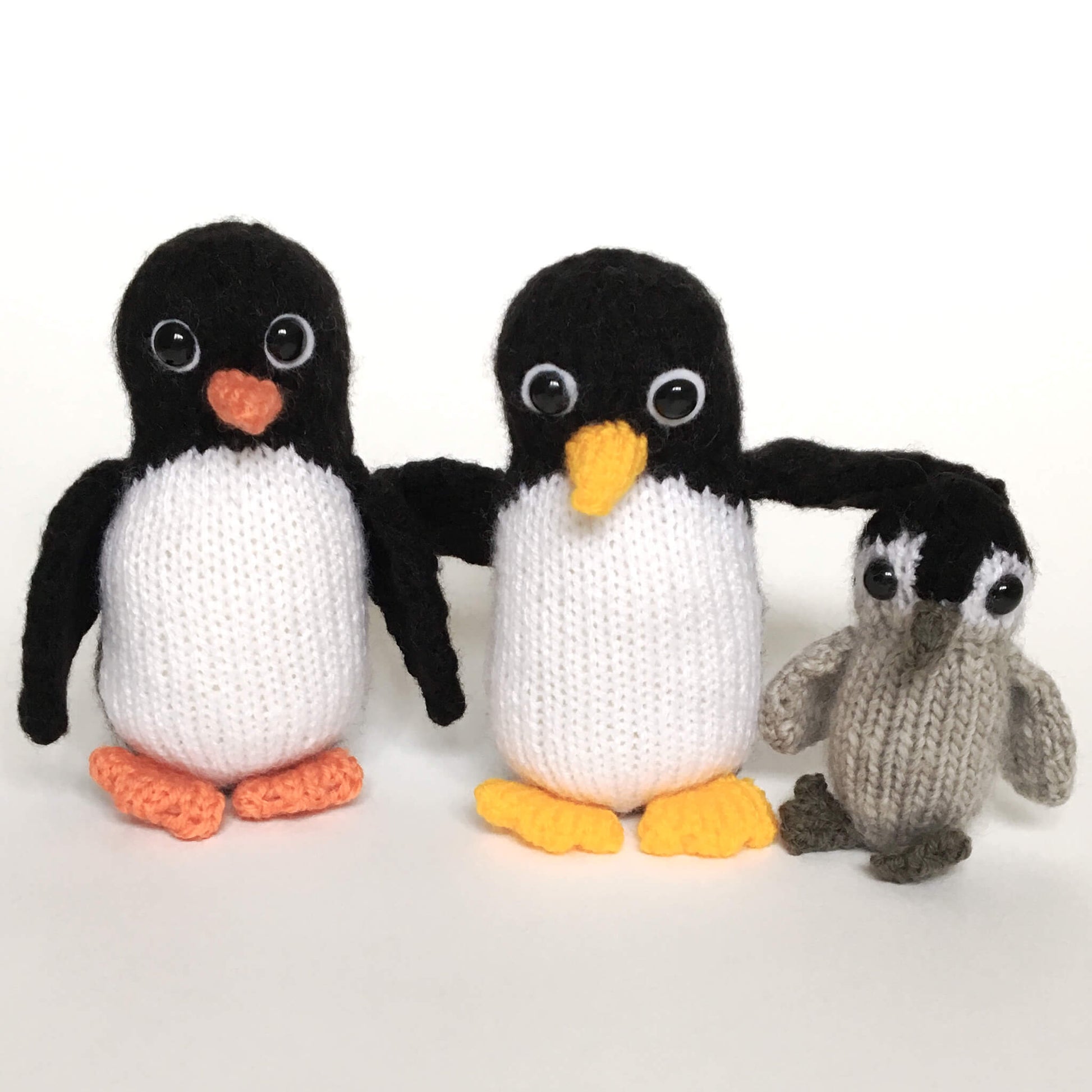 a penguin soft toy knitting pattern for adult and baby penguins