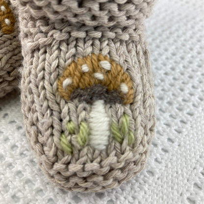 toadstool embroidery on knitting pattern for baby booties